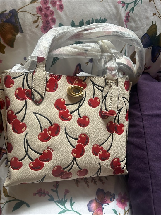Coach Handbags - Coach Cream Tote with Red Cherry Print and Gold Hardware